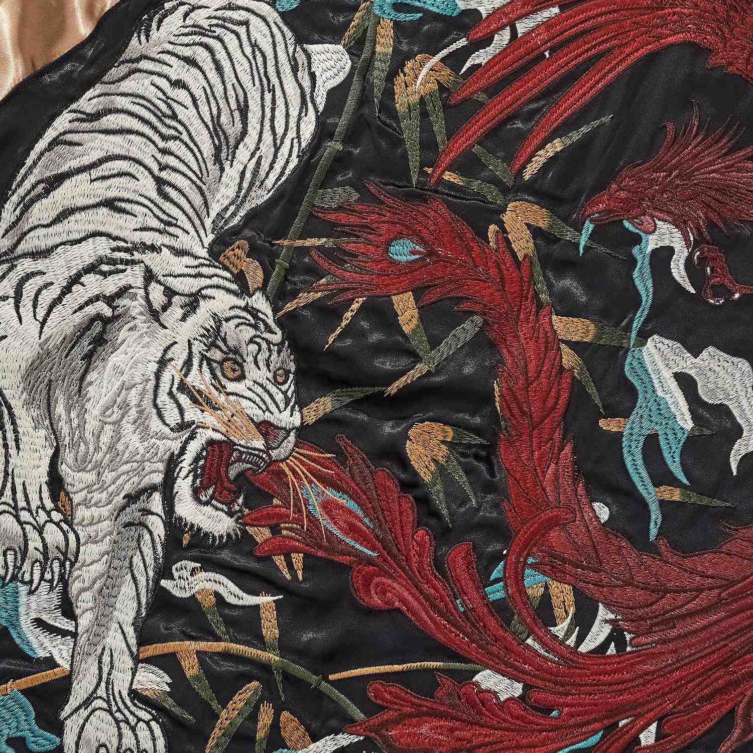 Back detail — roaring white tiger facing the vermilion bird.