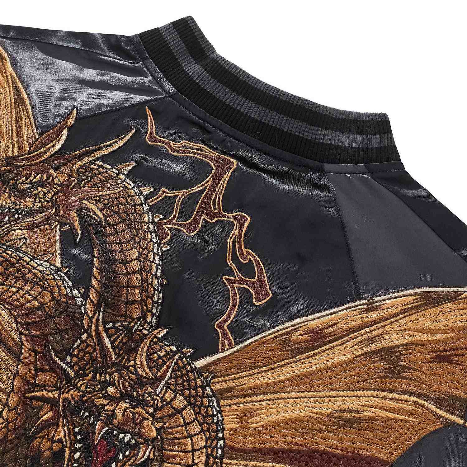 Back shoulder embroidery and wing texture close-up.