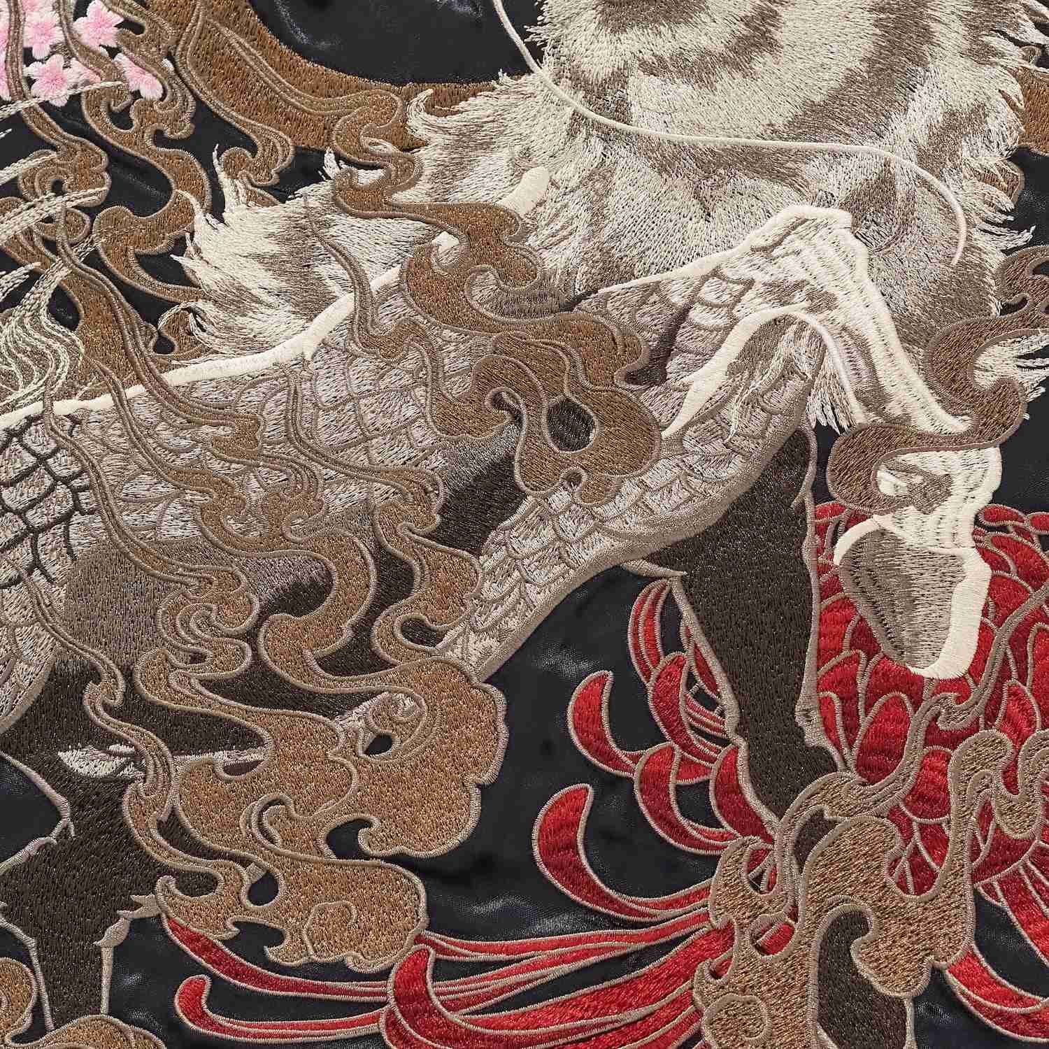 Kirin scales with swirling cloud embroidery over red chrysanthemum plumes.