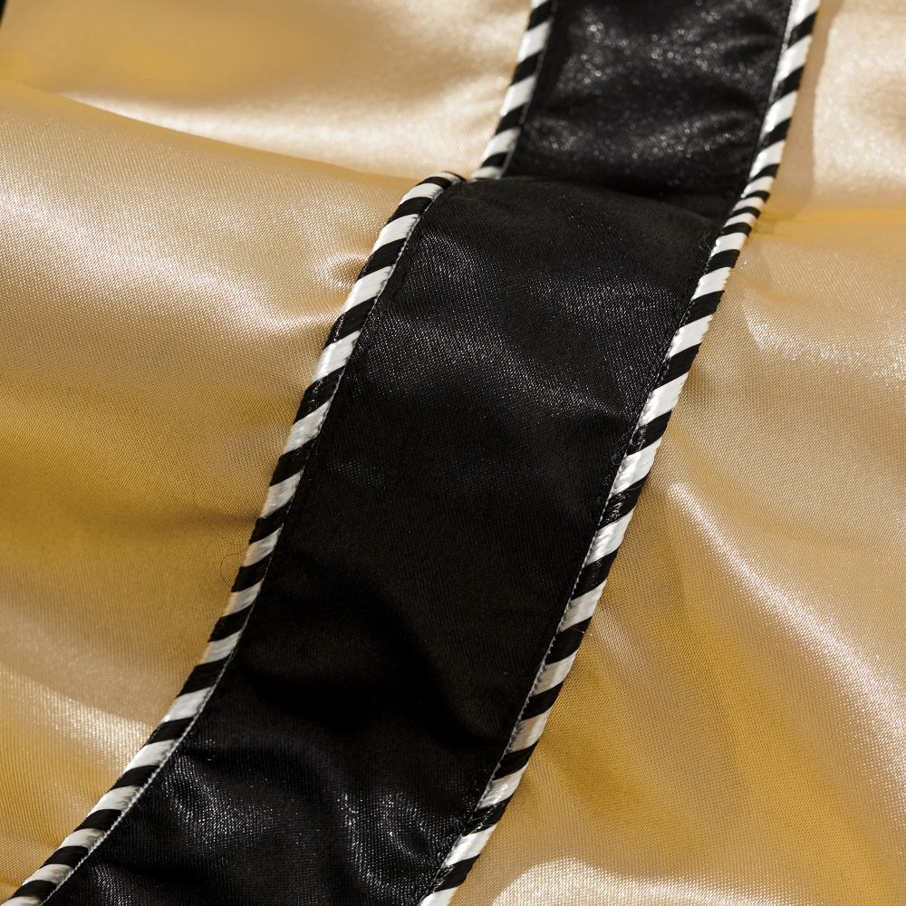 Close-up of twisted black and white piping along satin sleeve of Dragon Balls anime sukajan jacket.