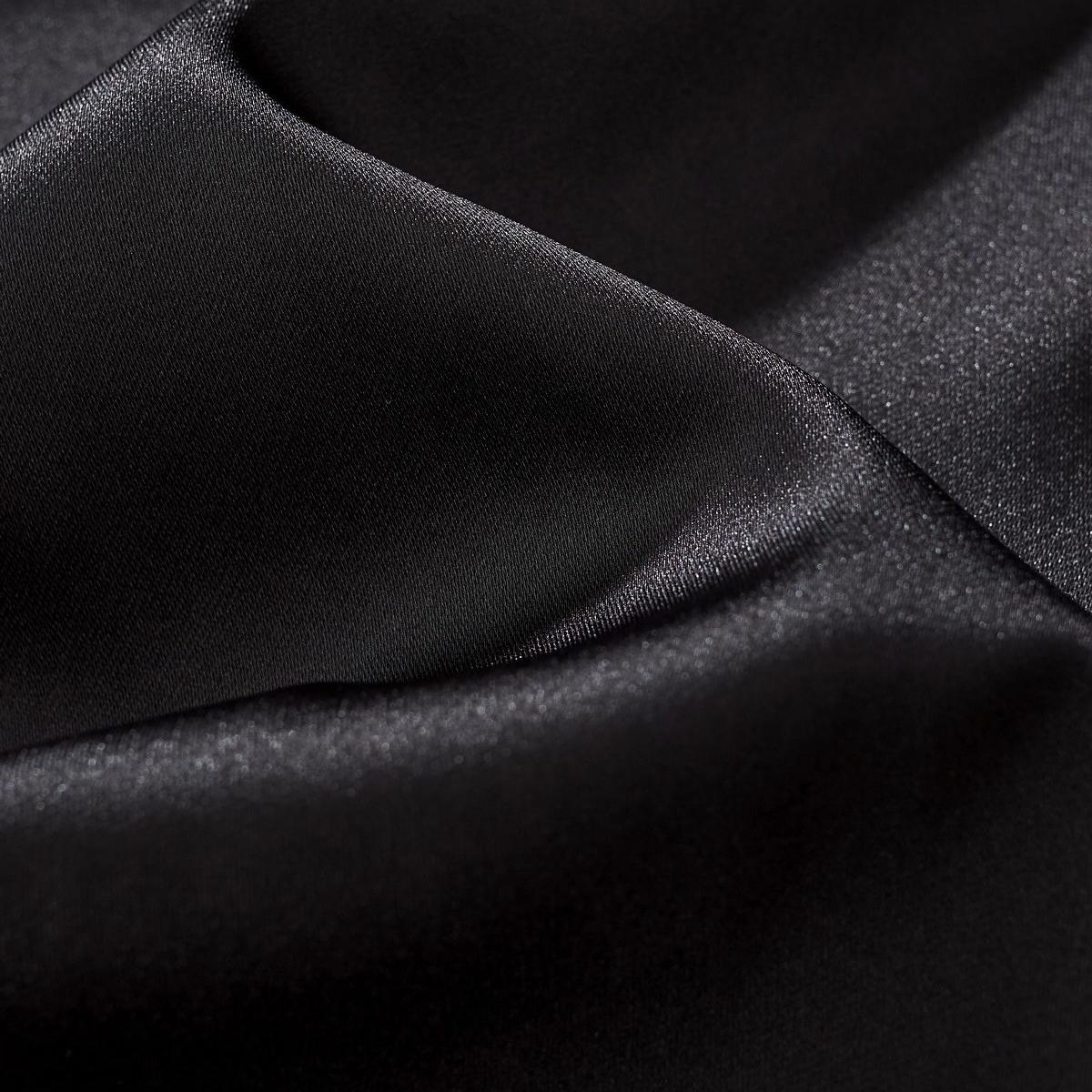 Smooth black satin with a subtle sheen; soft, drapey hand for a premium feel.