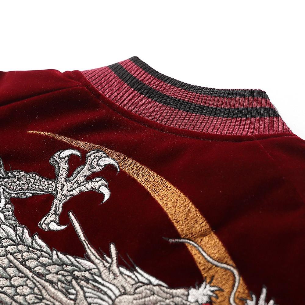 Back collar area with rib-knit trim and arc embroidery detail