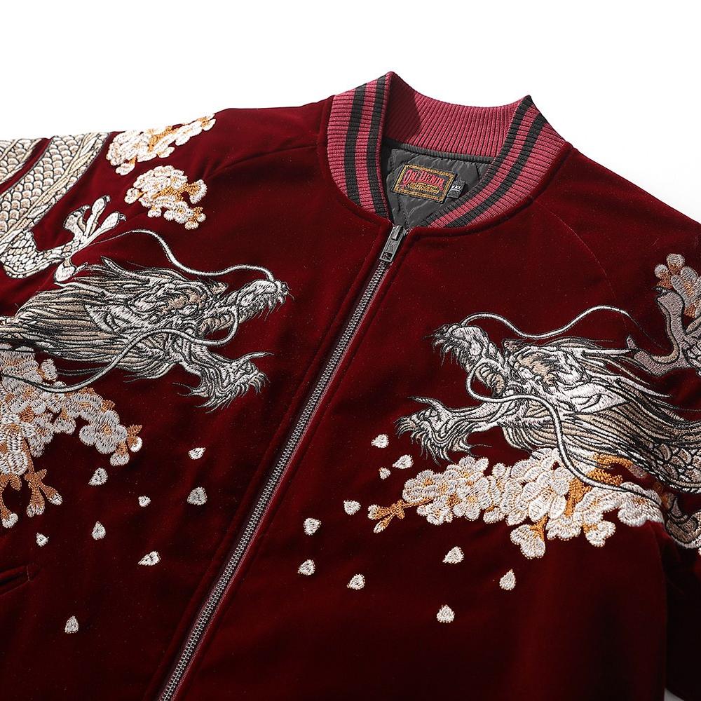Collar and chest detail highlighting dragon embroidery and scattered petals