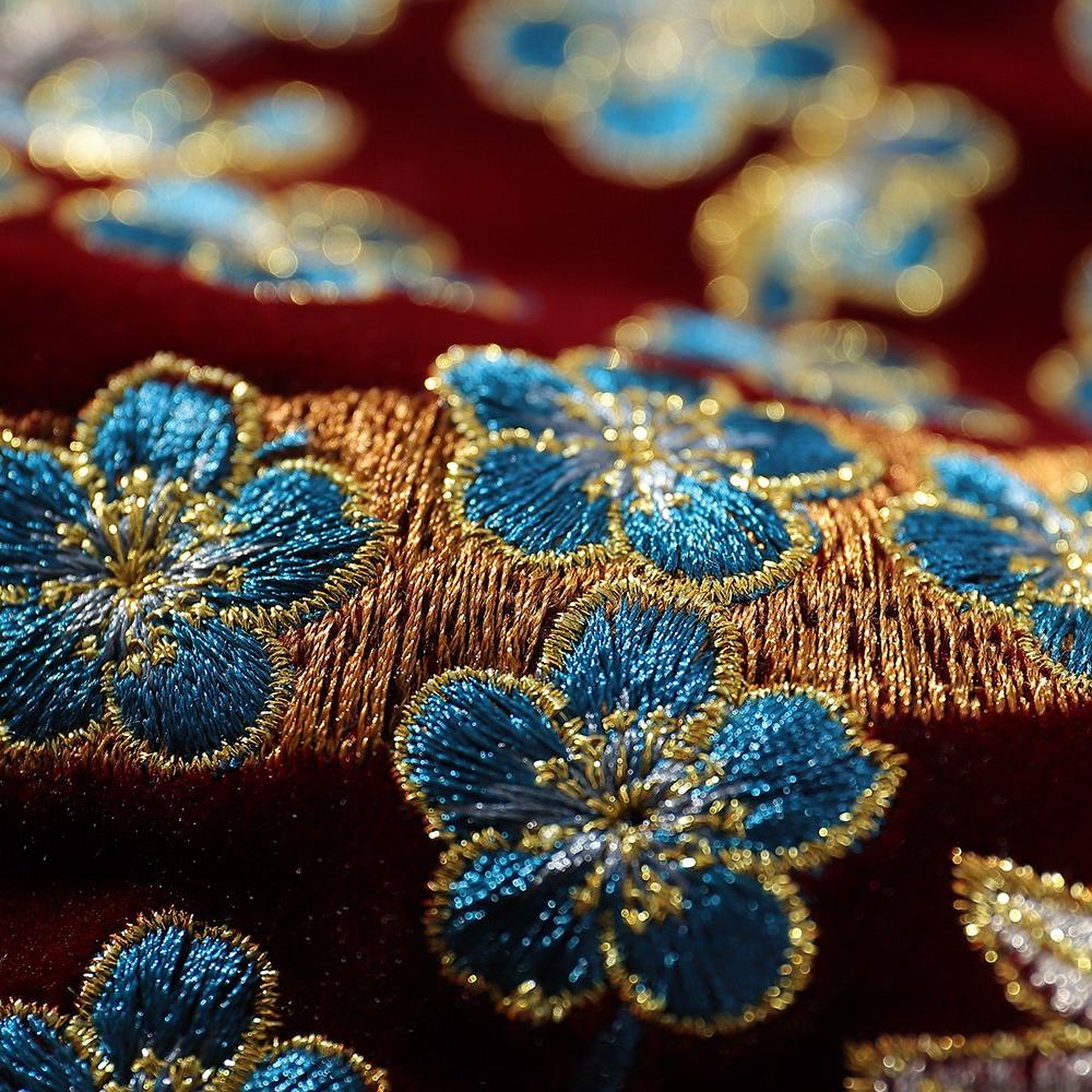 Macro of clustered sakura blossoms with layered threadwork and shimmering edges