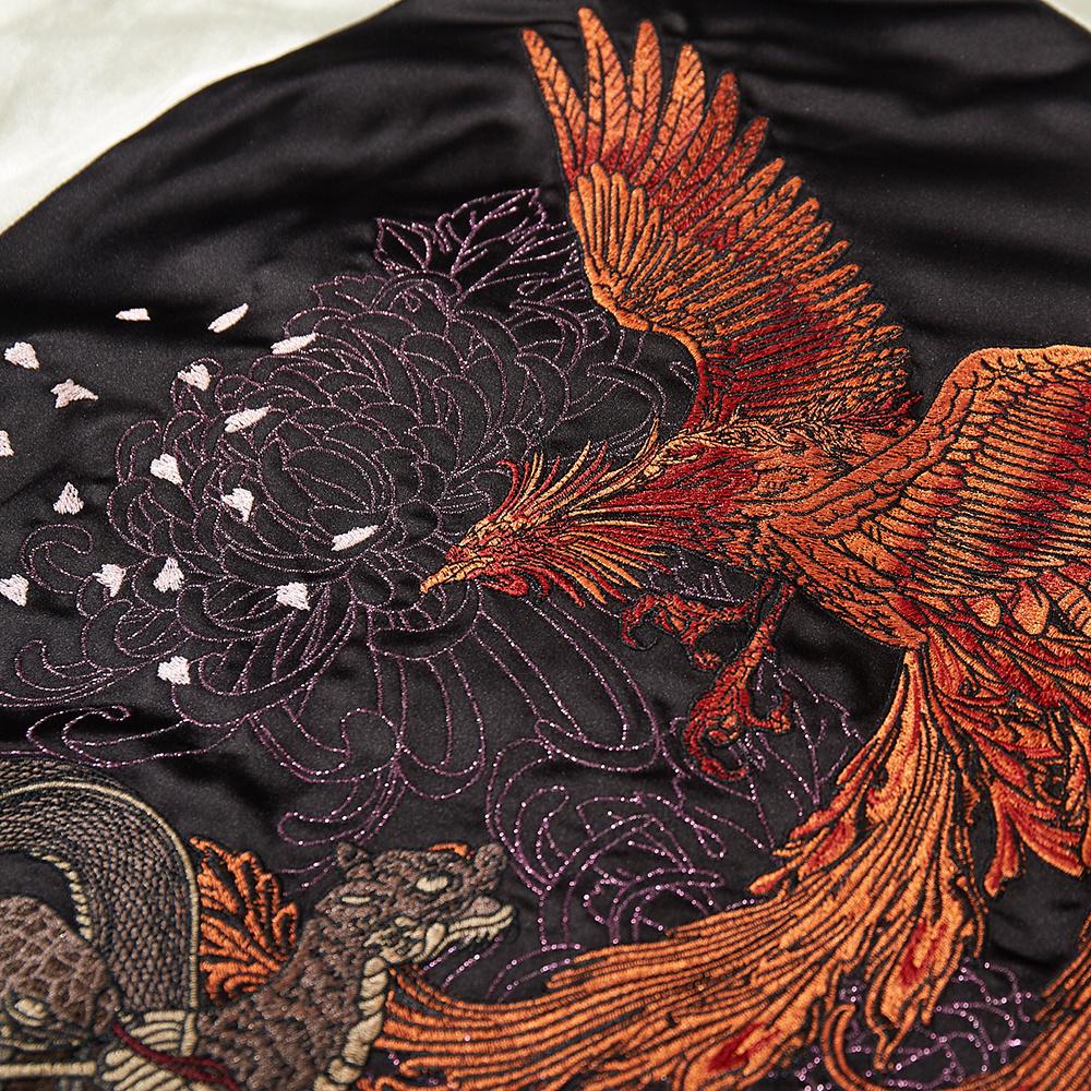 Close-up of phoenix with chrysanthemum and sakura petals, back embroidery