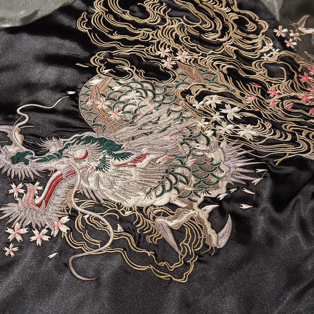 Close-up of dragon and clouds embroidery on a black sukajan