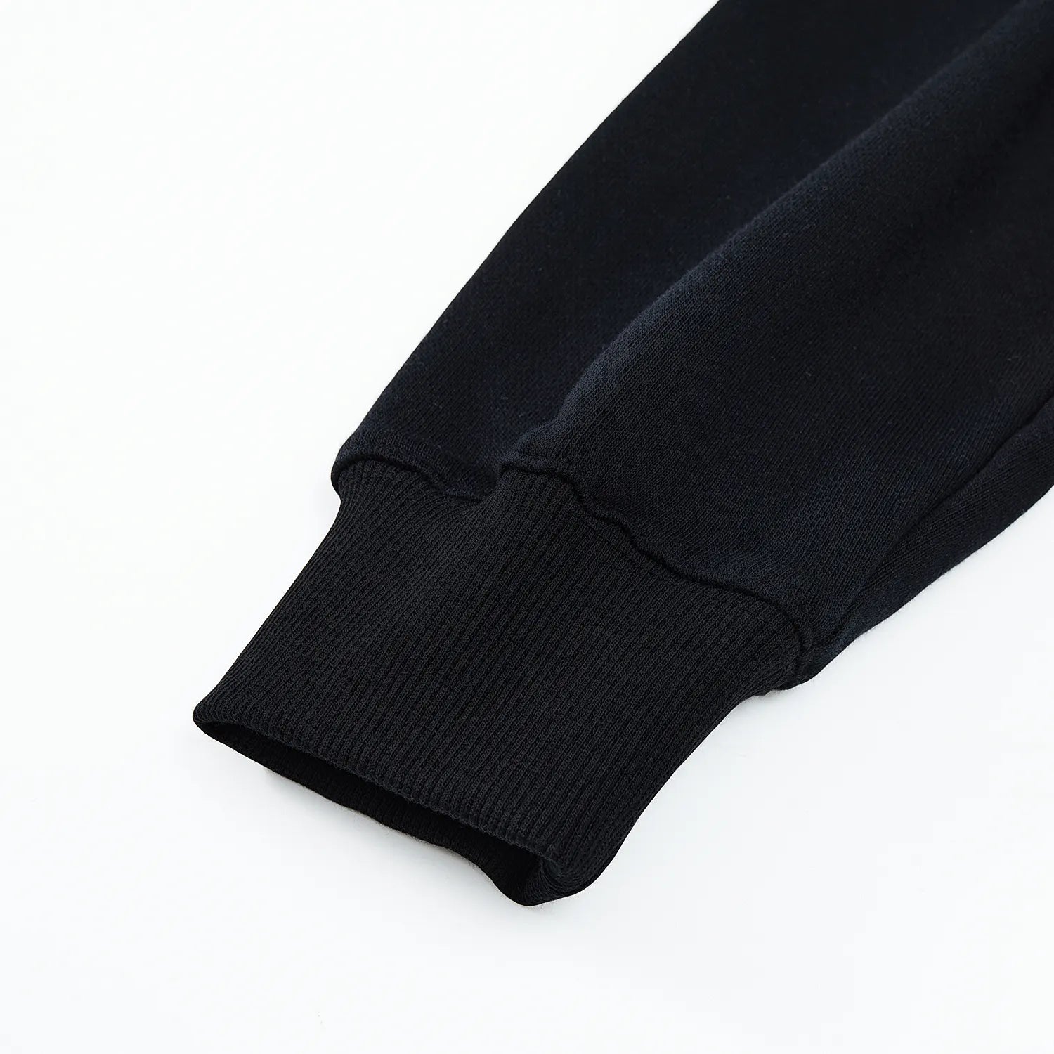 Ribbed sleeve cuff detail on black Nine-Tailed Fox & Lotus sweatshirt