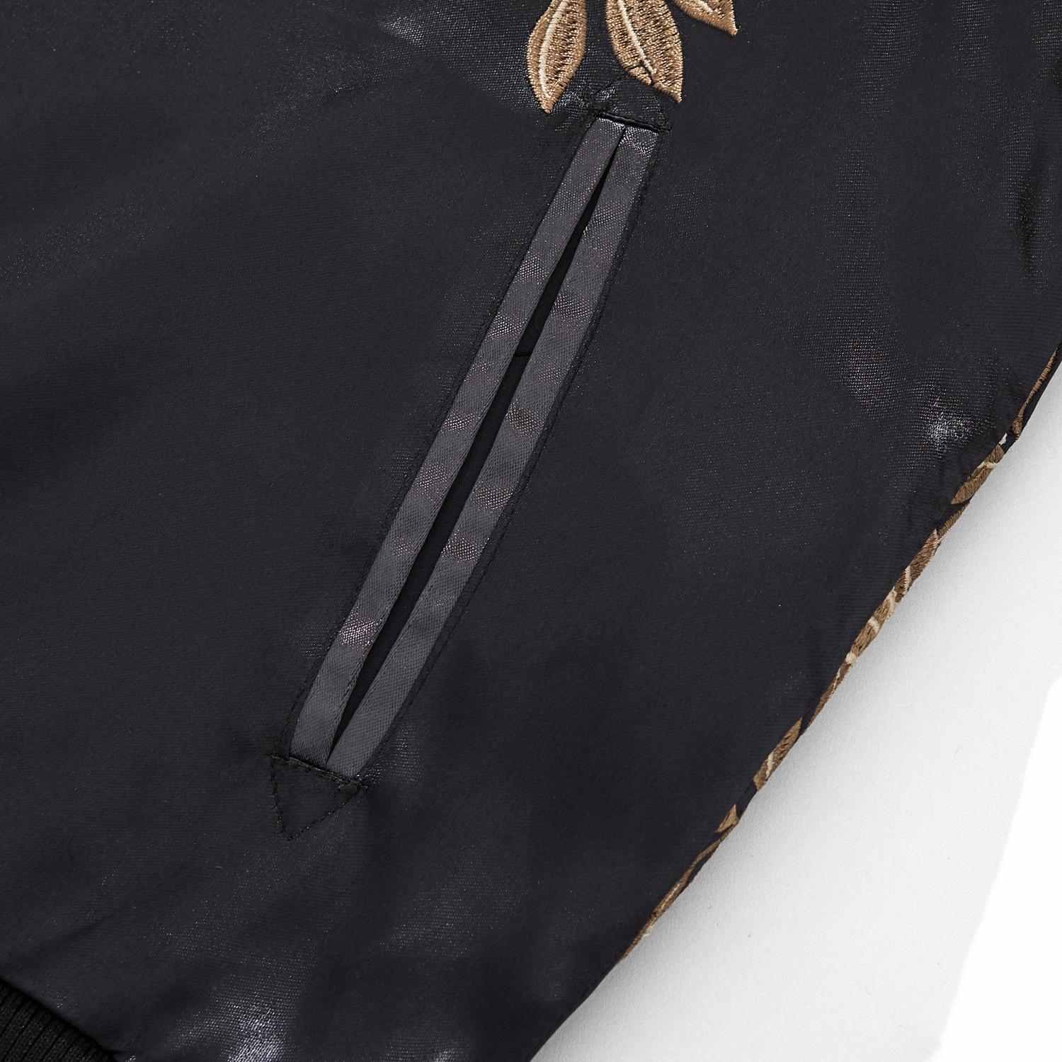 Slant pocket trim detail on the sukajan jacke