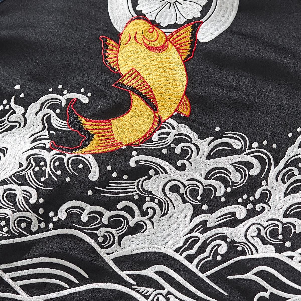 Close-up of the back koi leaping through foamy waves