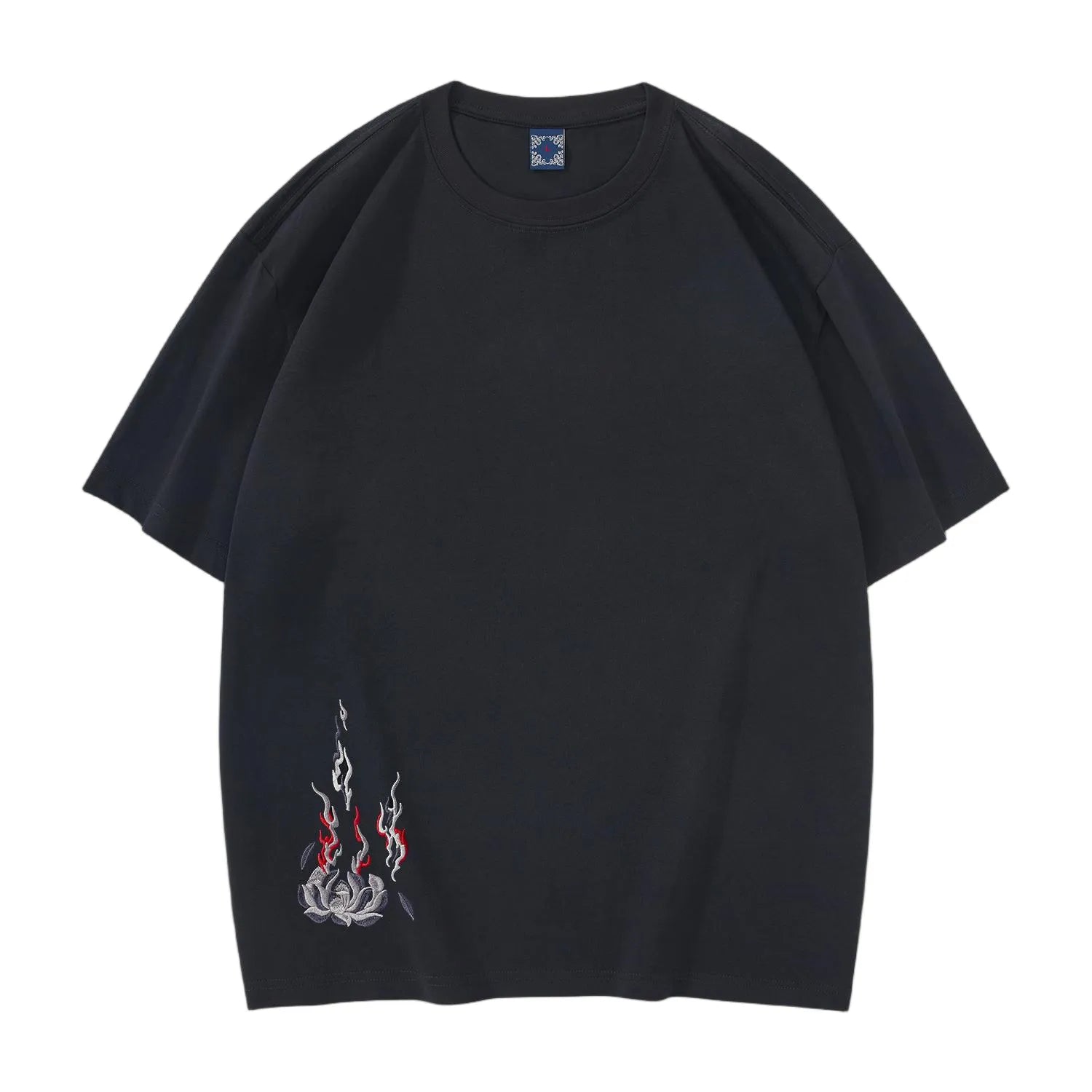 Front view of black cotton streetwear T-shirt with minimalist burning lotus embroidery on the lower hem.