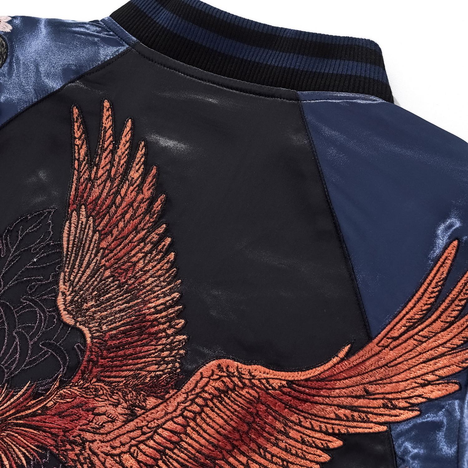 Close-up of the back shoulder showing the ribbed collar and detailed Vermilion Bird (Phoenix) wing embroidery.