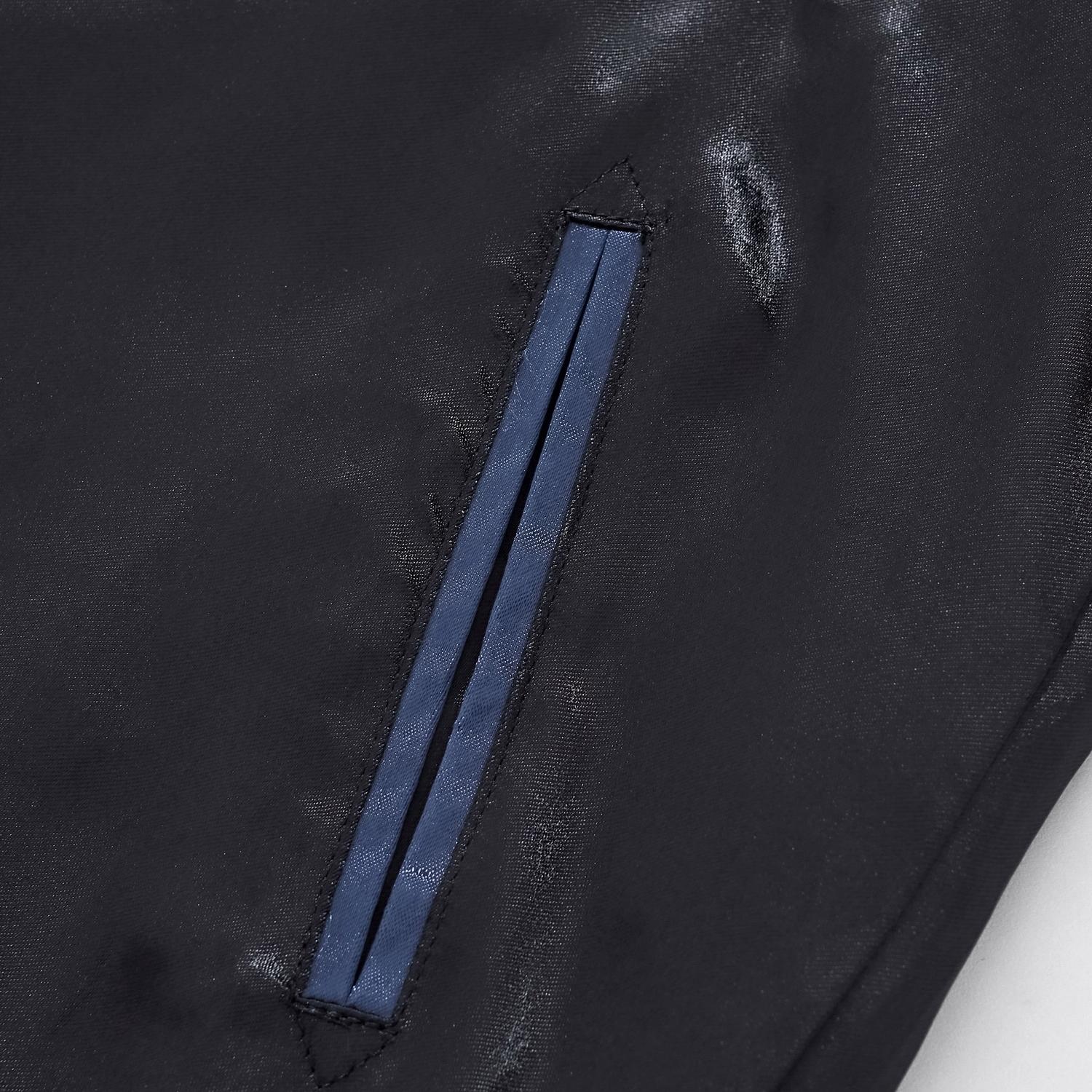 Close-up of the reinforced side welt pocket with blue trim on the black premium rayon fabric.
