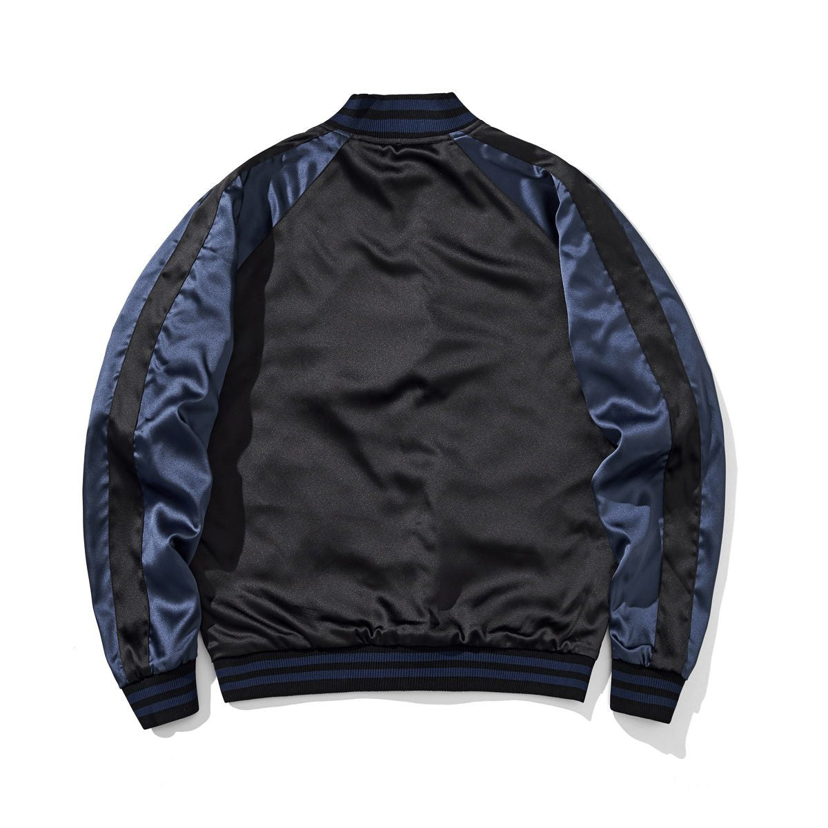 Back view of the navy colorway, peony face, featuring a clean satin panel and raglan sleeves