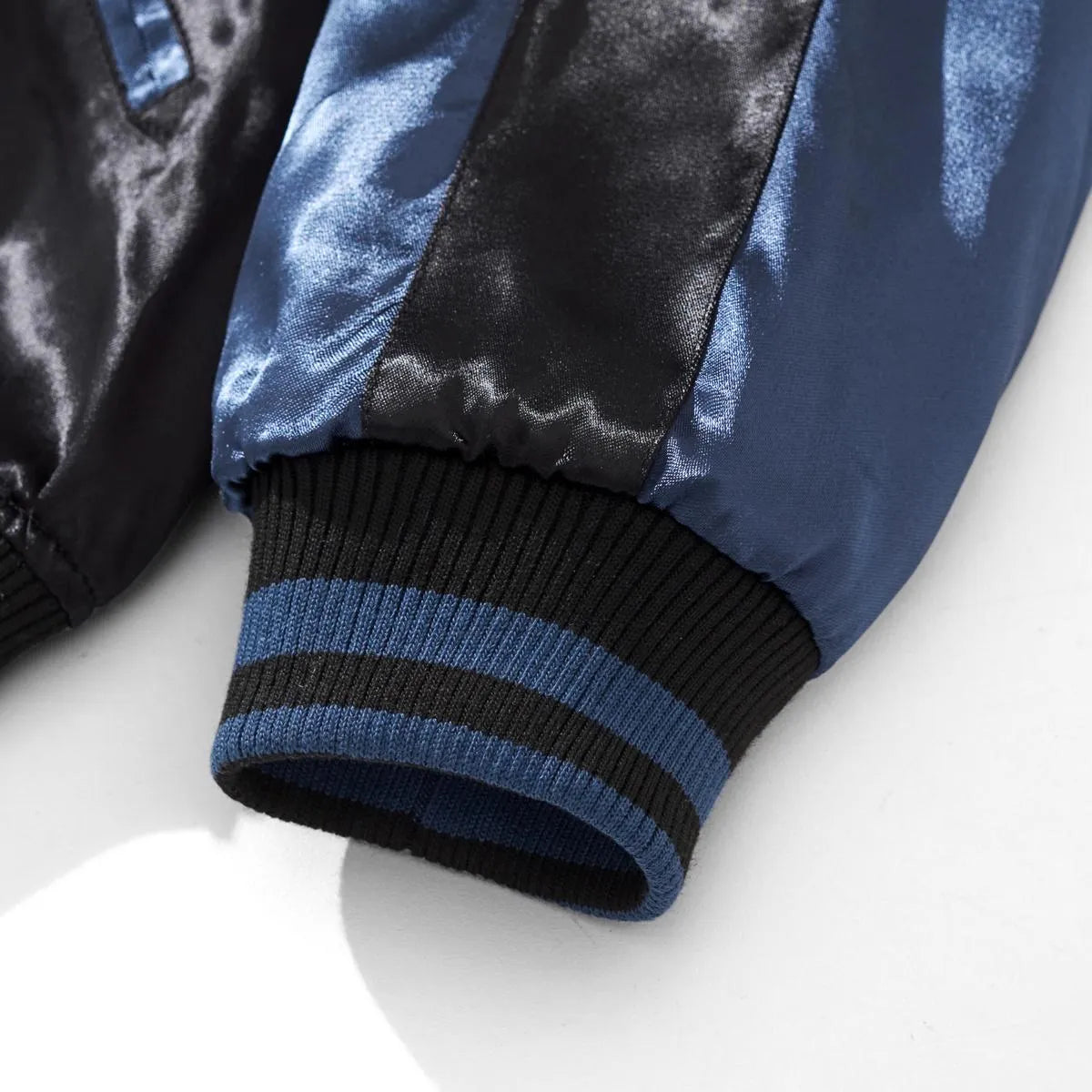 Detail of the elastic ribbed cuff on the Navy rayon sleeve.