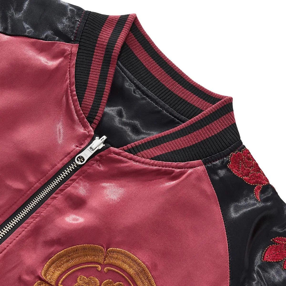 Close-up of the vintage-style ribbed collar and metal zipper construction.