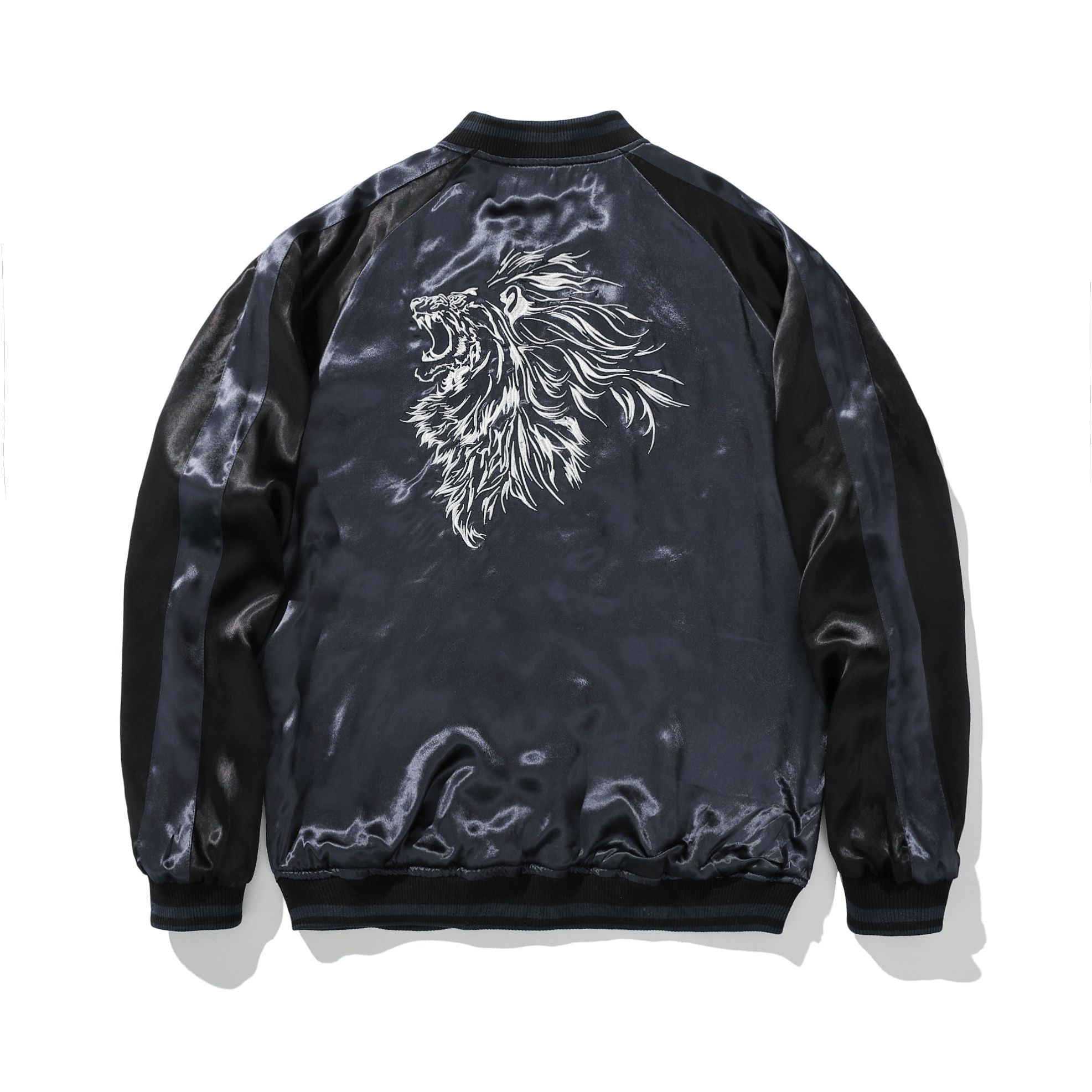Reverse back—monochrome lion head outline embroidery on satin.