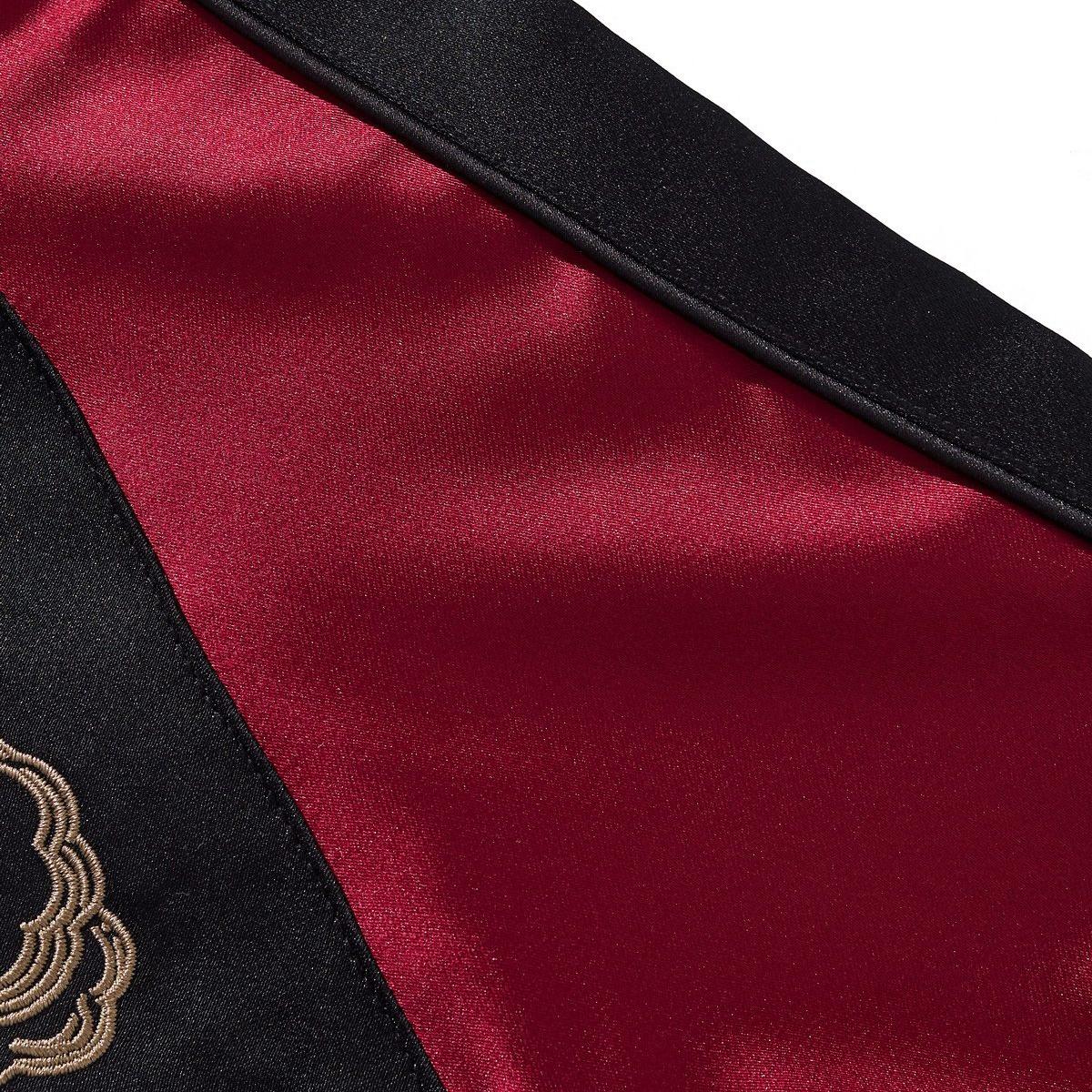 Smooth satin sleeve panel with contrast stripe detail
