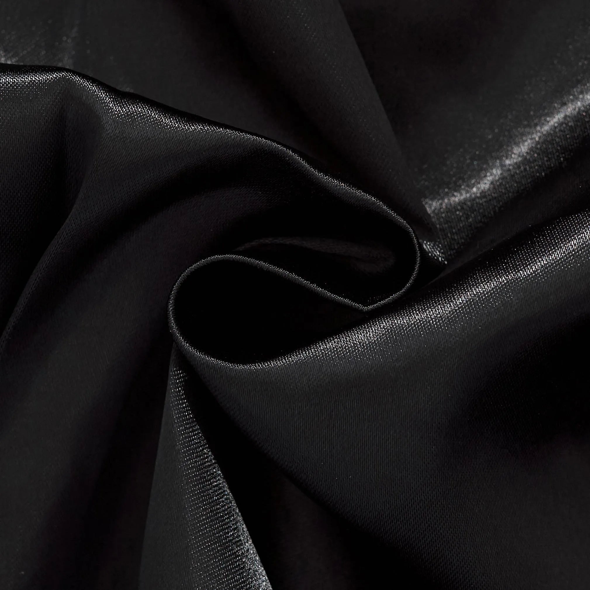 Texture shot showing the smooth, high-gloss finish of the premium satin fabric inside the jacket.