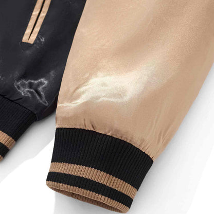 Gold sleeve cuff with striped rib knit and satin sheen.