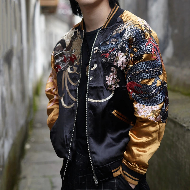 On-body — gold sleeves front view; blue dragon and phoenix with sakura motifs on sleeves.