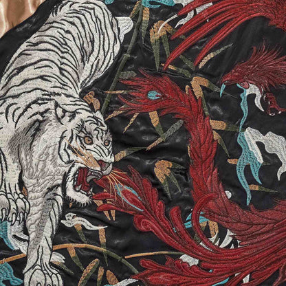 Back detail — roaring white tiger facing the vermilion bird.