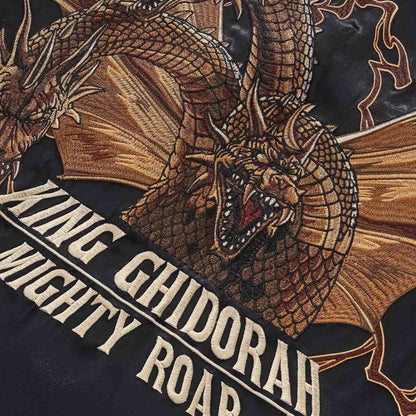 King Ghidorah head embroidery close-up over Mighty Roar text.