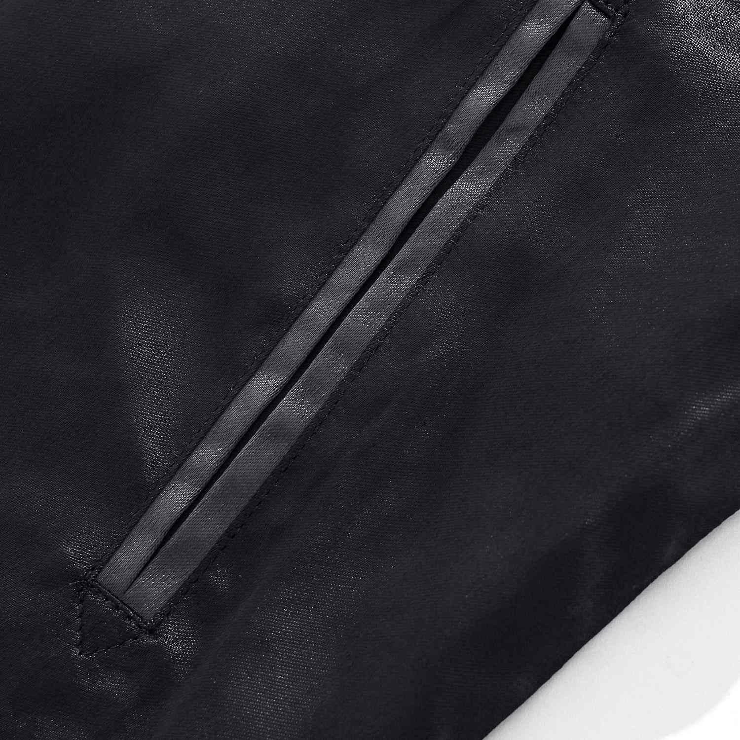 Slanted hand pocket detail with clean piping.