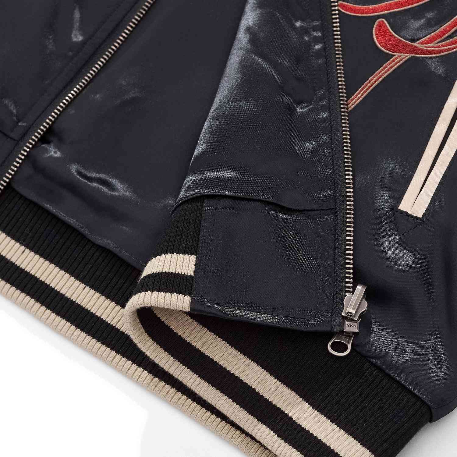 Ribbed hem with YKK zipper guard at the front placket.