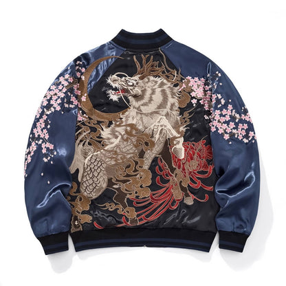 Back view — navy sleeves; kirin under crescent moon with clouds; red chrysanthemum; scattered sakura on sleeves.