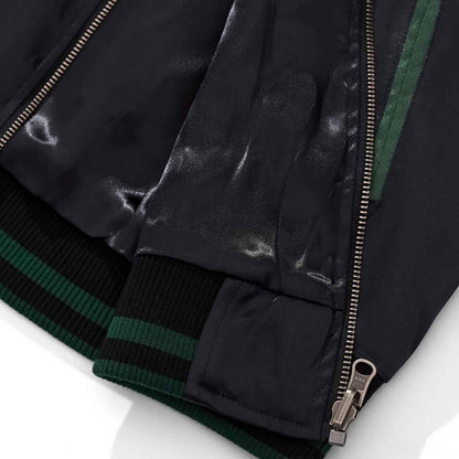 Hem rib knit and side zipper finish detail.