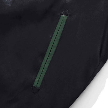 Slanted pocket welt detail.