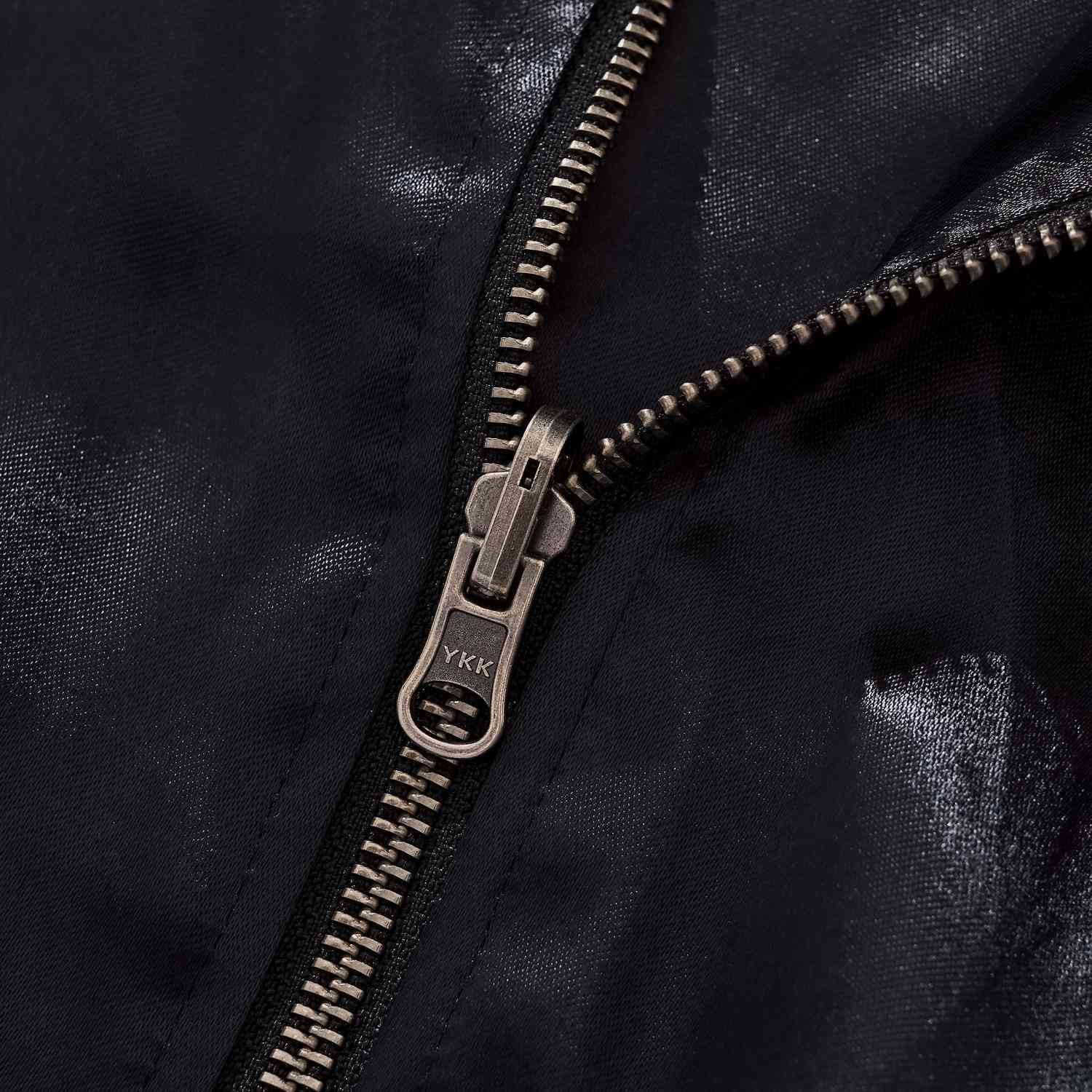 YKK metal zipper close-up.