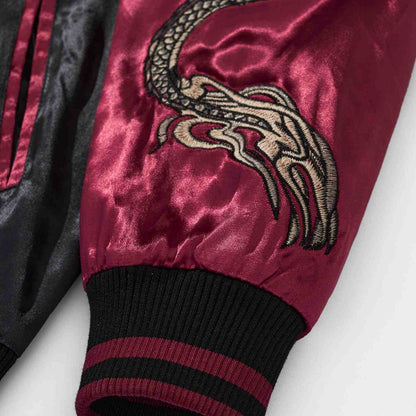 Ribbed cuff detail on sleeve with dragon claw motif.
