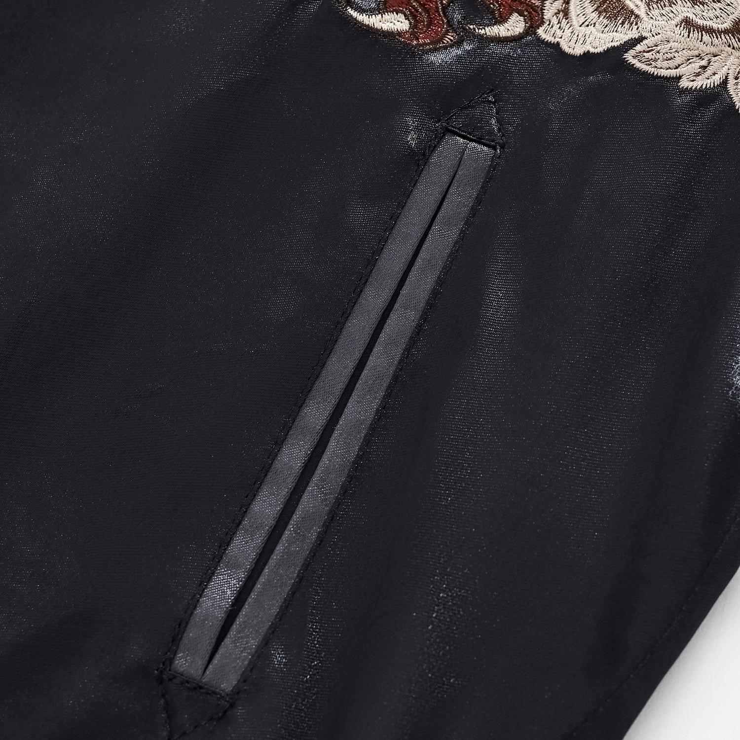 Welt pocket opening on black body panel.