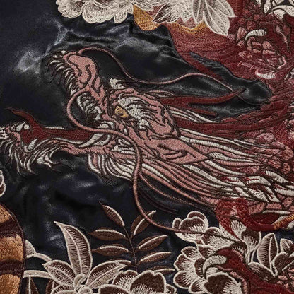 Back detail — flowing dragon mane and scales, fine stitching.