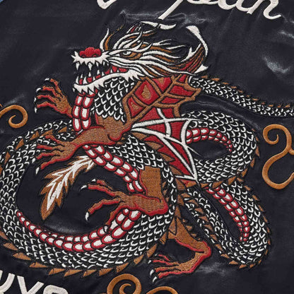 Back dragon embroidery close-up with layered scales.