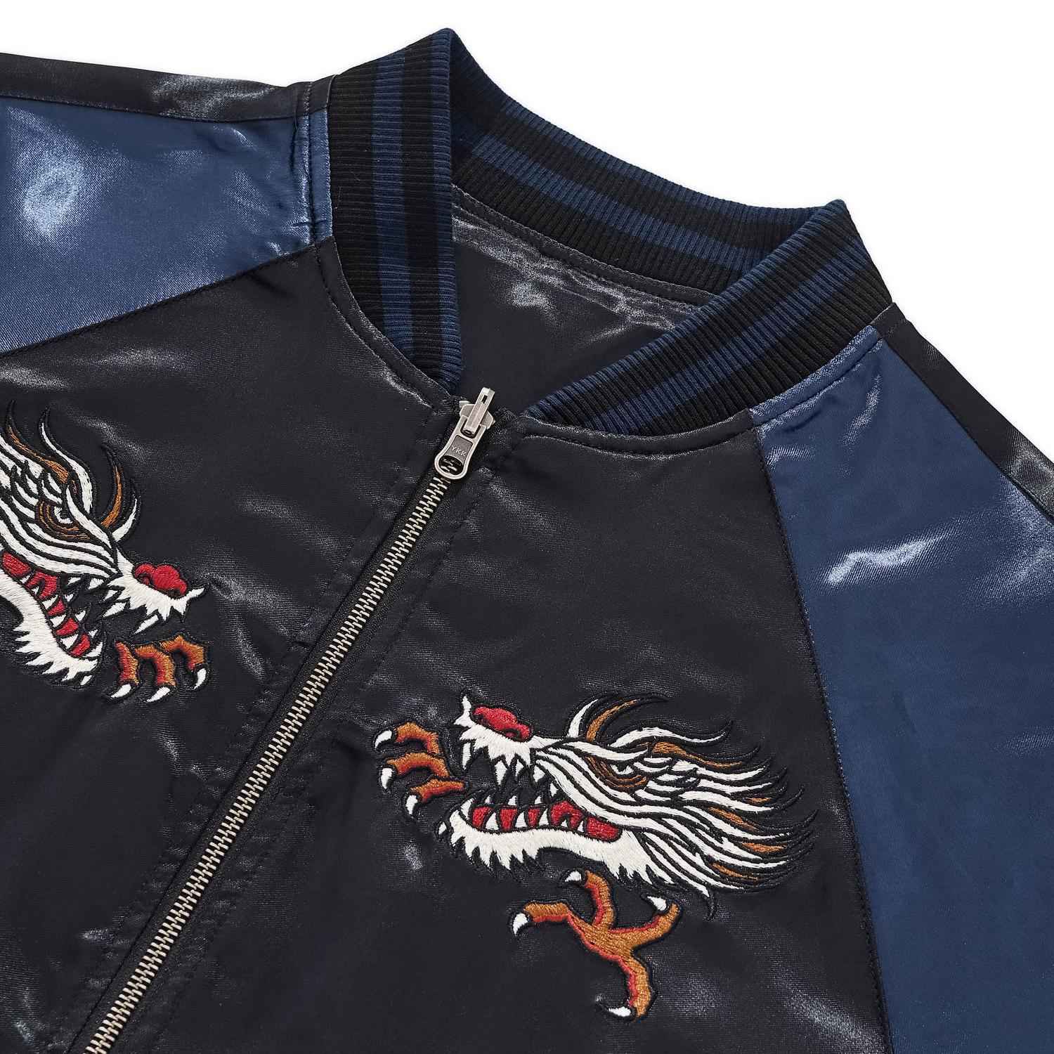 Ribbed collar and raglan seam with chest dragon embroidery.