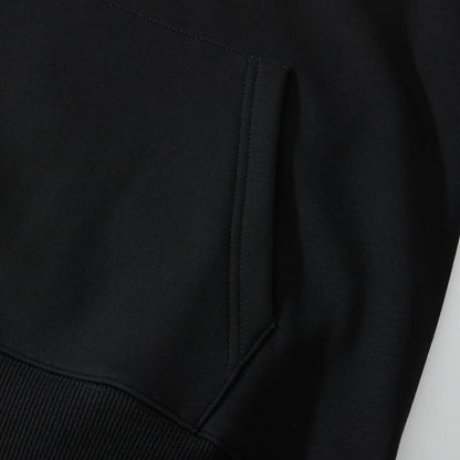 Kangaroo pocket detail on the black Blue Phoenix & Lotus Embroidered Hoodie with tidy topstitching