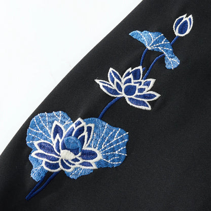 Lotus flower sleeve embroidery on the black hoodie with crisp satin stitches