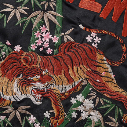 Large back tiger embroidery detail with layered stitches and rich shading