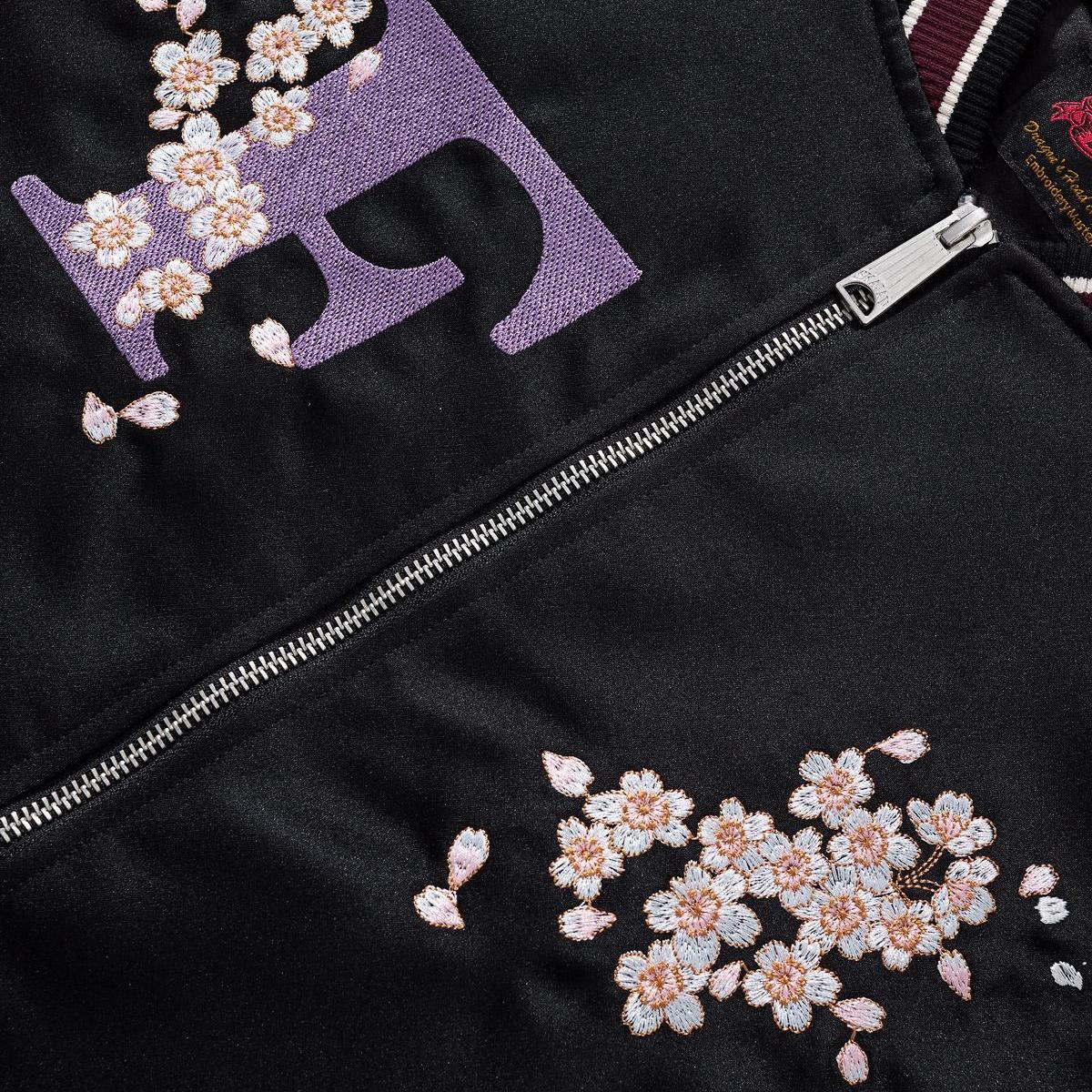 Front chest “F” applique and cherry blossom embroidery with metal zipper