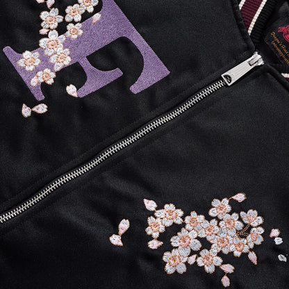Front chest “F” applique and cherry blossom embroidery with metal zipper