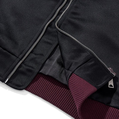 Hem and zipper construction detail with ribbed waistband