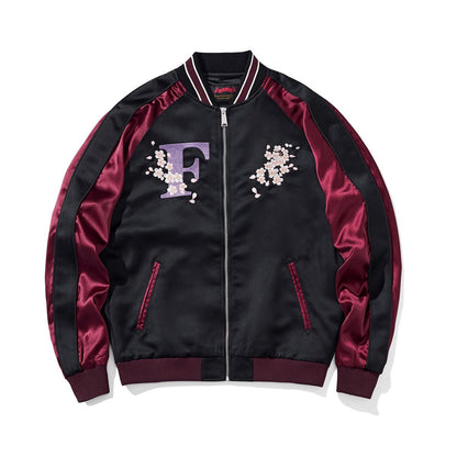 Front view with twin cherry blossom crests and initial “F”.