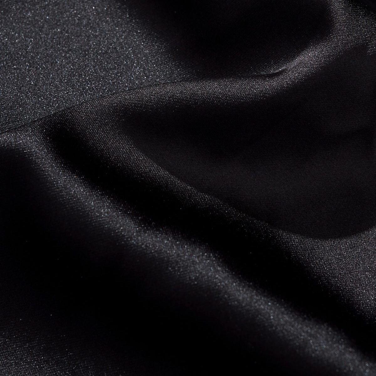 Close-up of the satin fabric showing a smooth sheen and fine texture