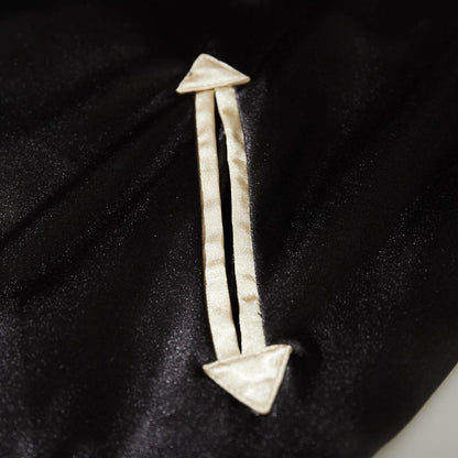 Detail of arrow-shaped welt pocket with beige piping on Dragon Ball Rider anime sukajan jacket.