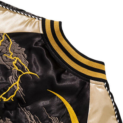 Detail of striped ribbed collar and lightning cloud embroidery on Goku Kamehameha Dragon Balls sukajan jacket.