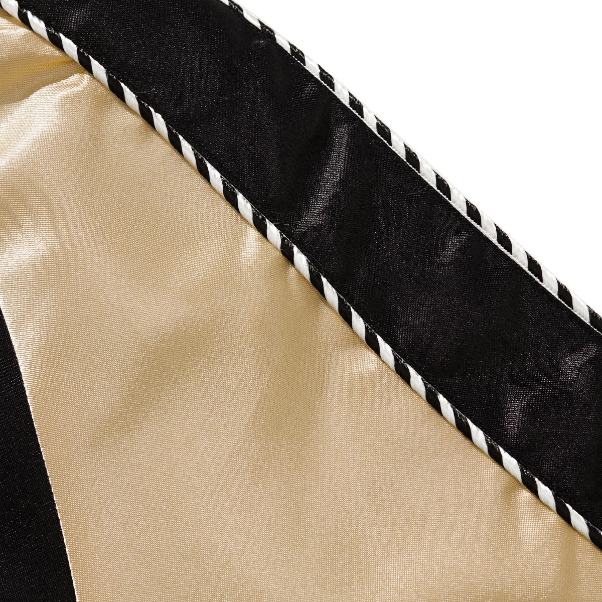 Detail of beige and black satin sleeve panel with contrast piping on Dragon Balls Goku sukajan jacket.