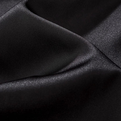 Smooth black satin with a subtle sheen; soft, drapey hand for a premium feel.