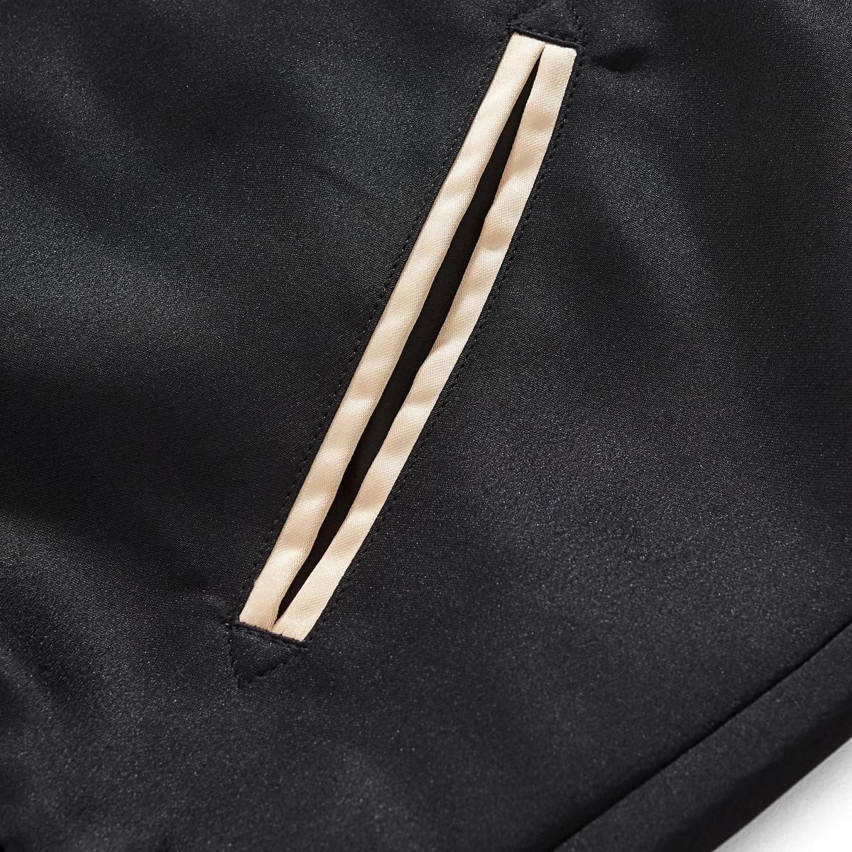 Welt pocket trimmed with contrast satin for a refined look.